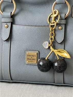Cherry Bag Charms or Keychains NWOT. Gold bag charm &  silver sparking cherries